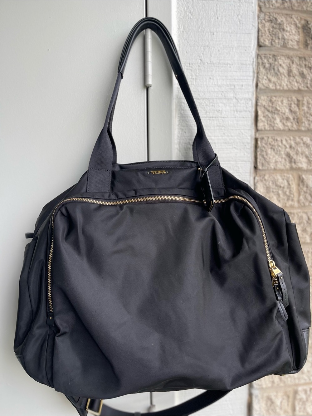 Tumi Black Nylon Duffel Bag with Gold Hardware